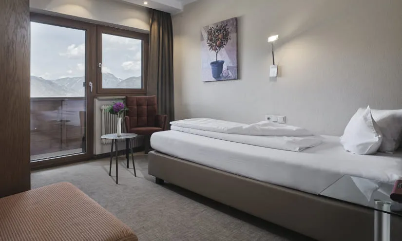 Gemütliches Einzelzimmer mit Balkon und Aussicht